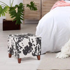 Puf cúbico con estampado de vaca, negro y marrón, reposapiés individual