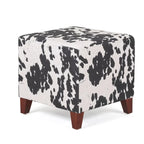 Puf cúbico con estampado de vaca, negro y marrón, reposapiés individual