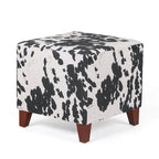 Puf cúbico con estampado de vaca, negro y marrón, reposapiés individual