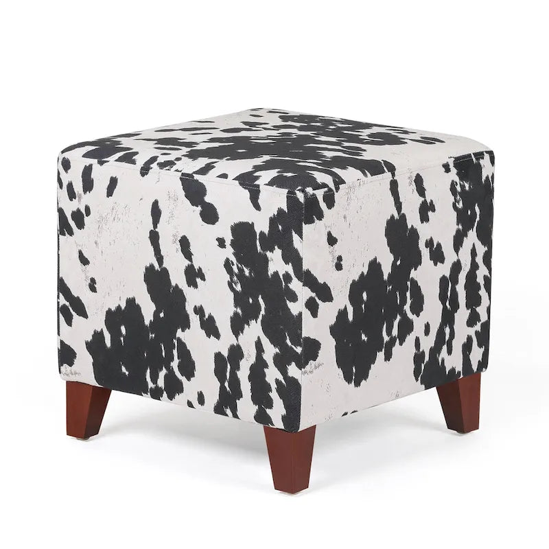Puf cúbico con estampado de vaca, negro y marrón, reposapiés individual