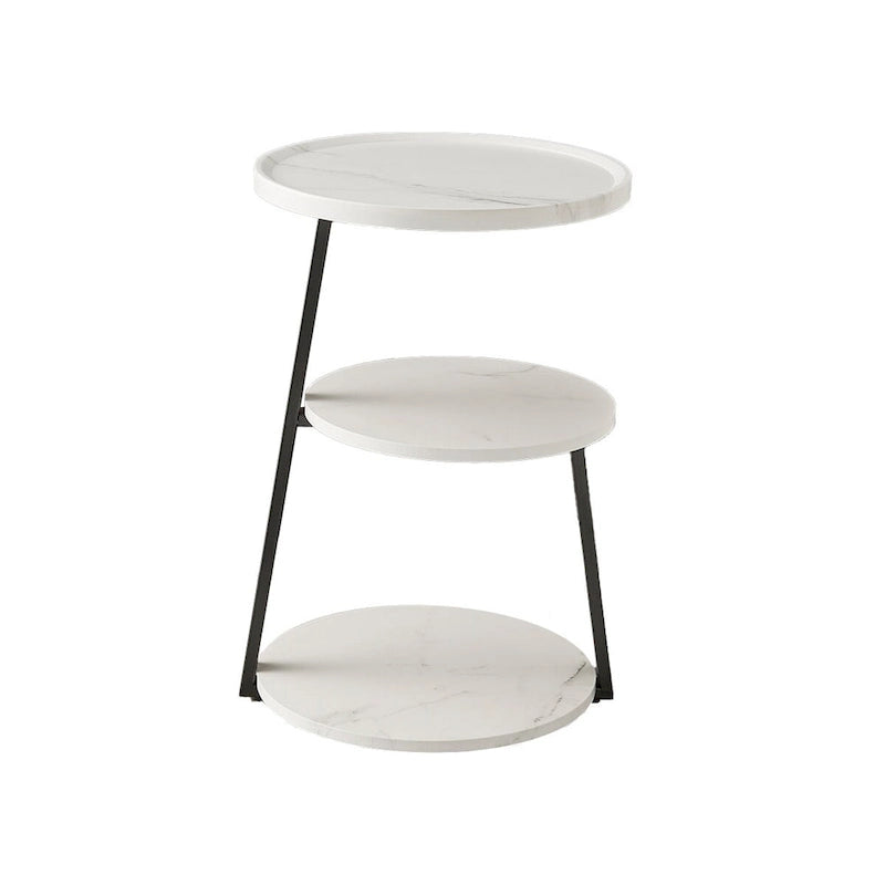 Mesa auxiliar redonda de tres niveles en blanco y negro con patas metálicas asimétricas